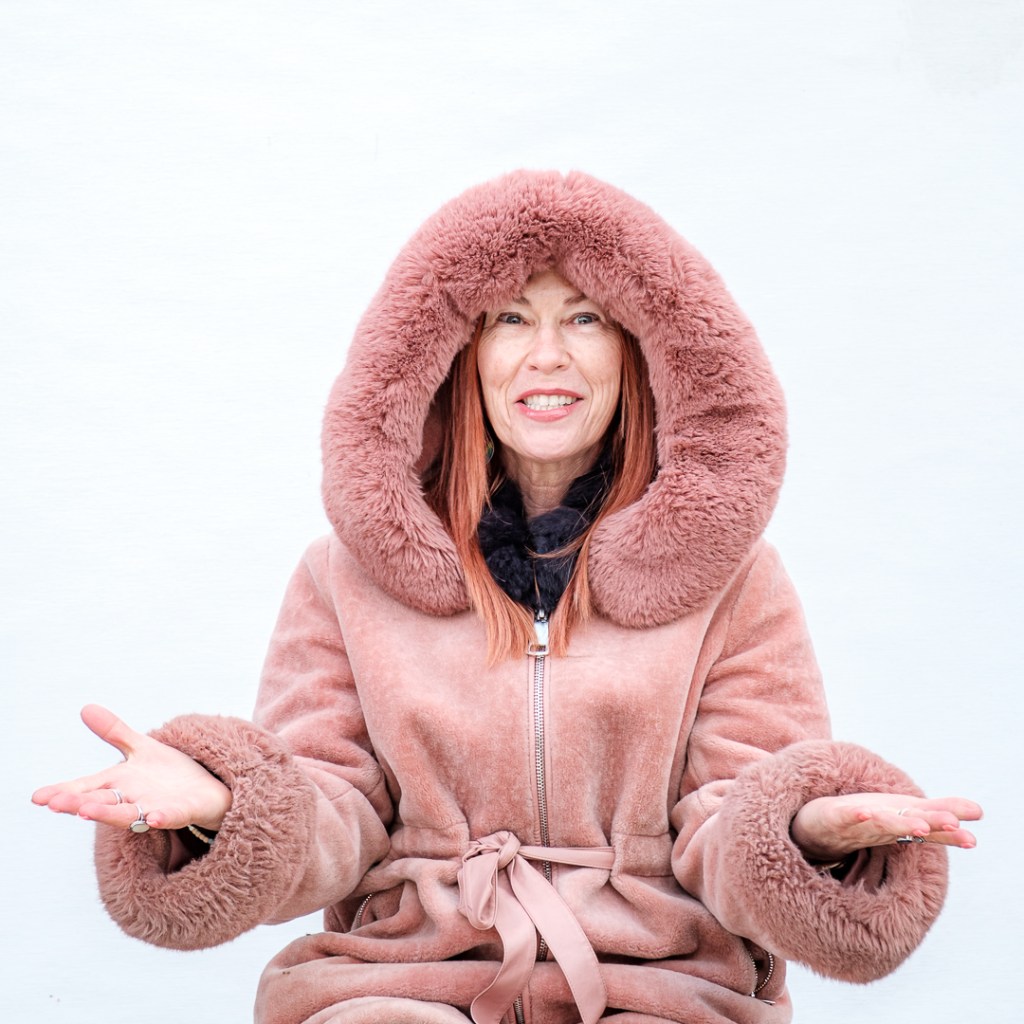 Lady in big coat with a hood